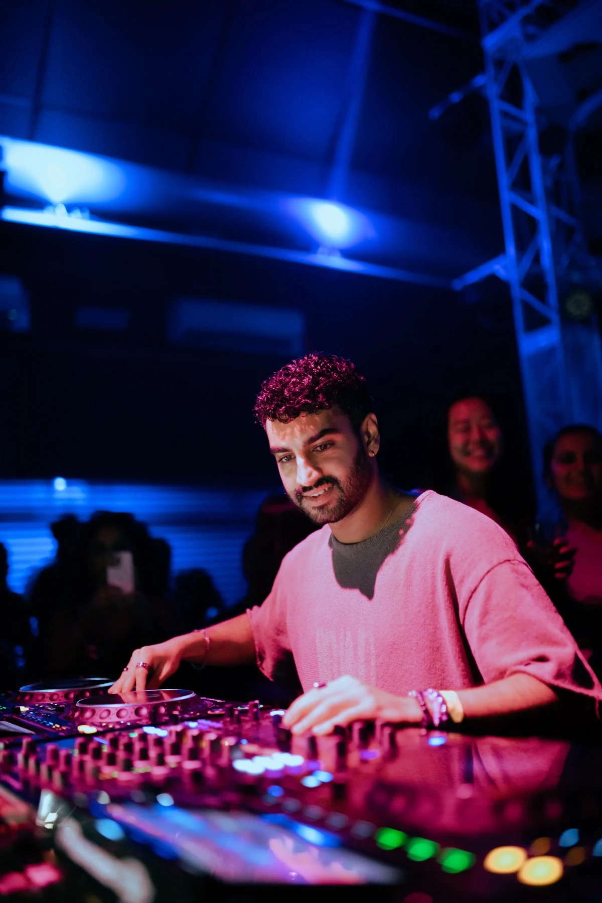 Amsal at the decks under blue and pink stage lighting